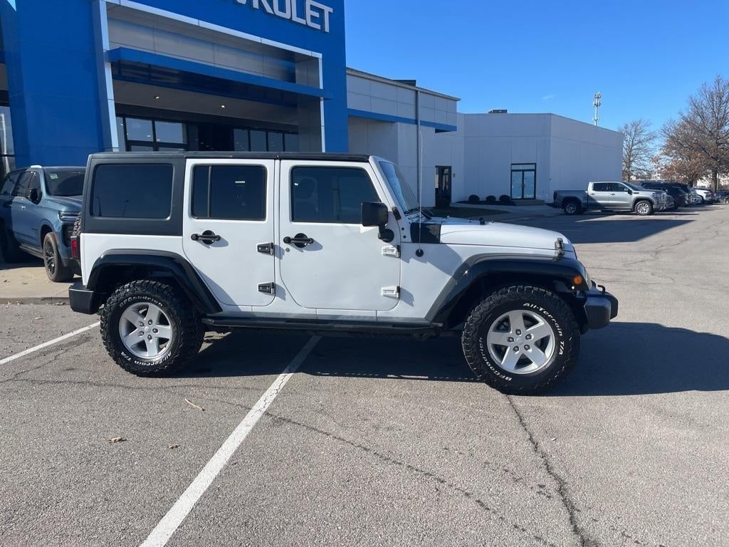 Used 2015 Jeep Wrangler Unlimited Sport with VIN 1C4BJWDG2FL726983 for sale in Kansas City