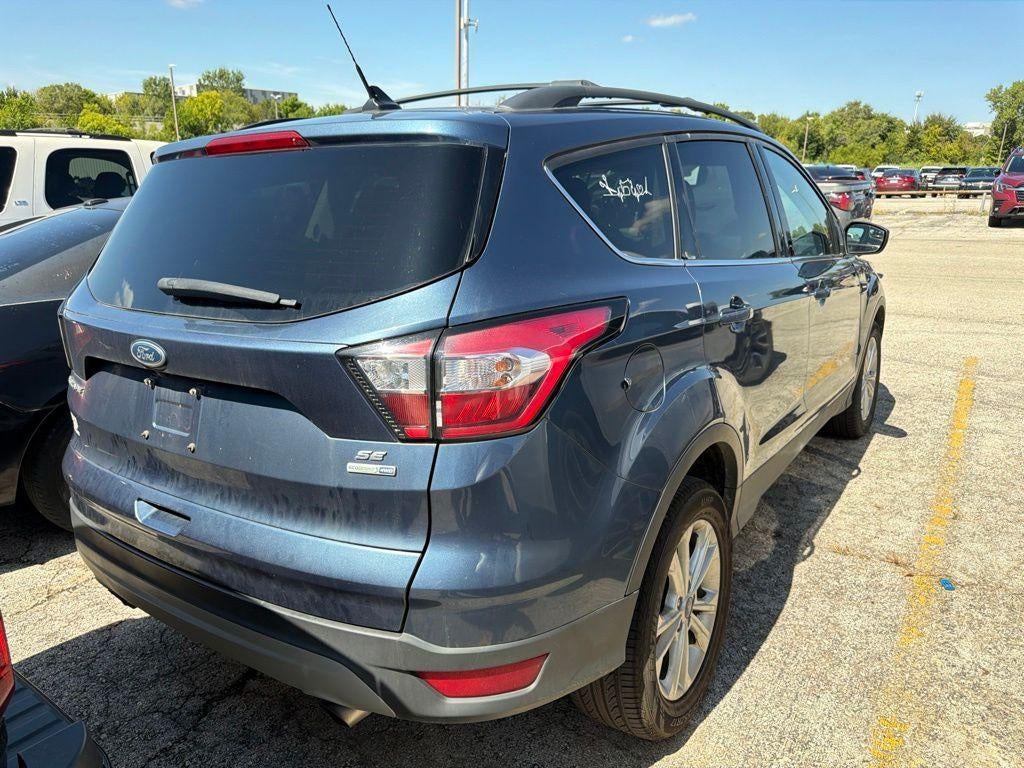 Used 2018 Ford Escape SE with VIN 1FMCU9GD2JUB60675 for sale in Kansas City